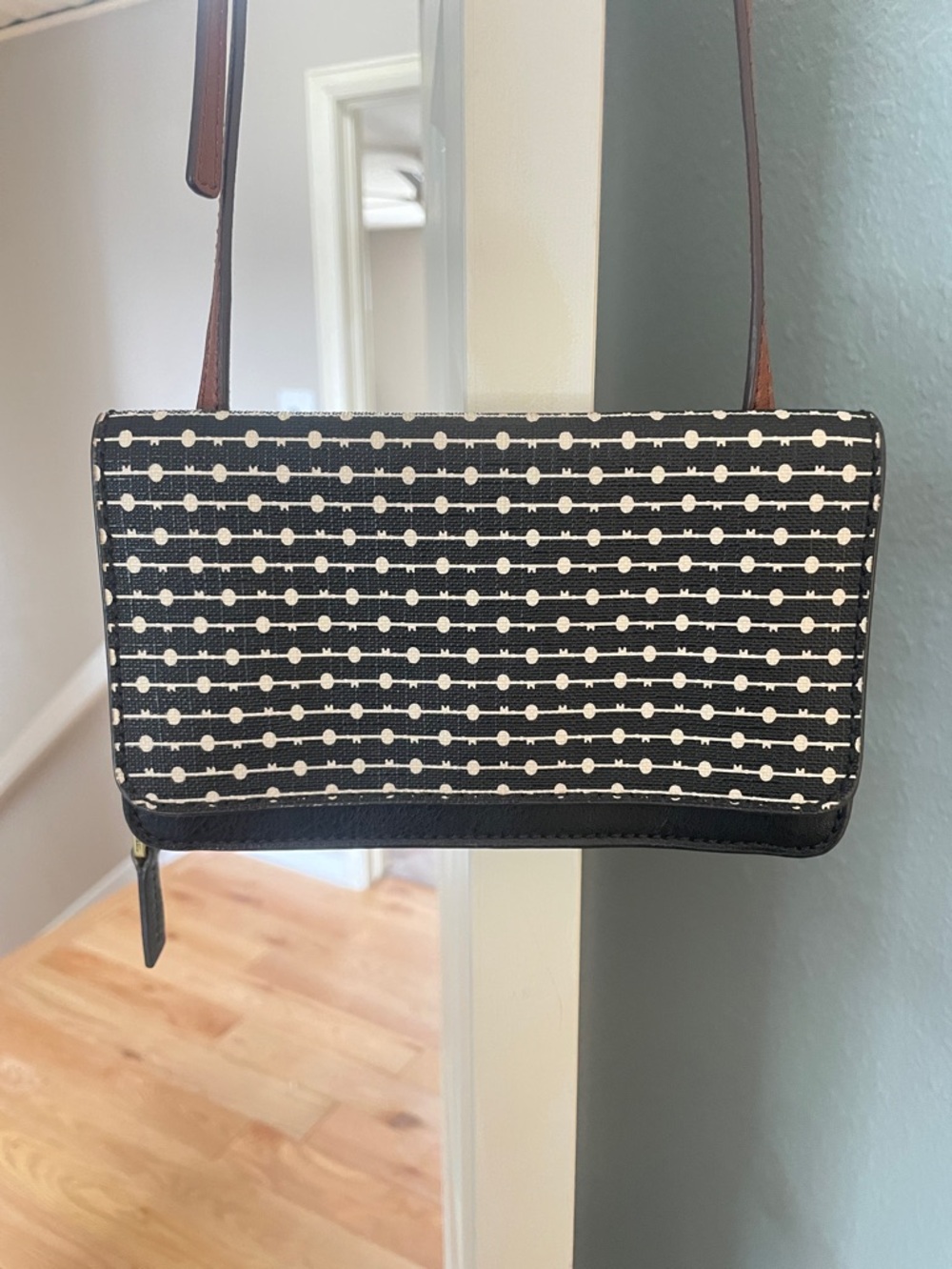 Fossil crossbody wallet. Large enough to hold a phone.  Like new.